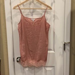 Pink Camisole with lace bottom.